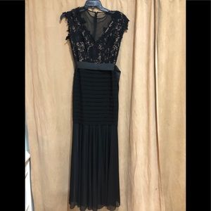 Formal black lace bodice figure fitting dress